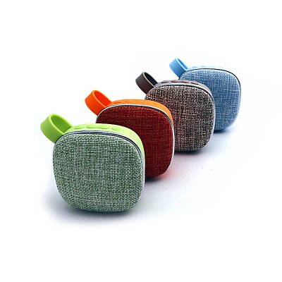 Bluetooth speaker with textile cover and tab